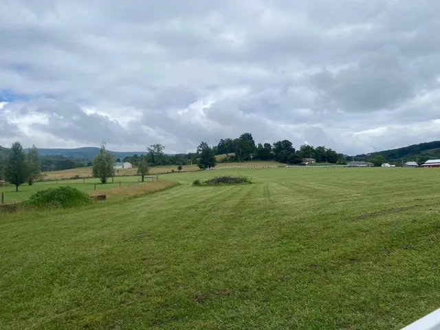 a view of a golf course with a yard