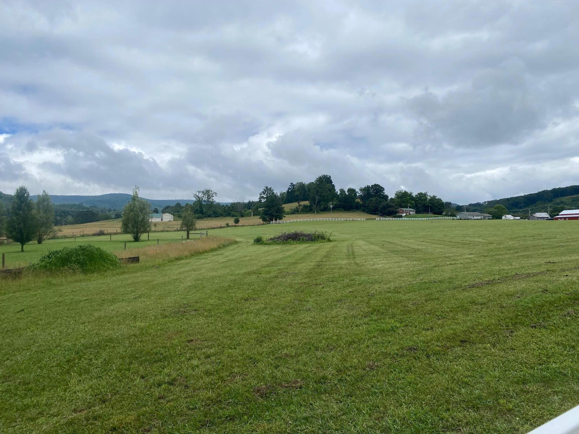 9727 Bent Mountain Road Bent Mountain, VA 24059 - Photo 4 of 6 a view of a golf course with a yard