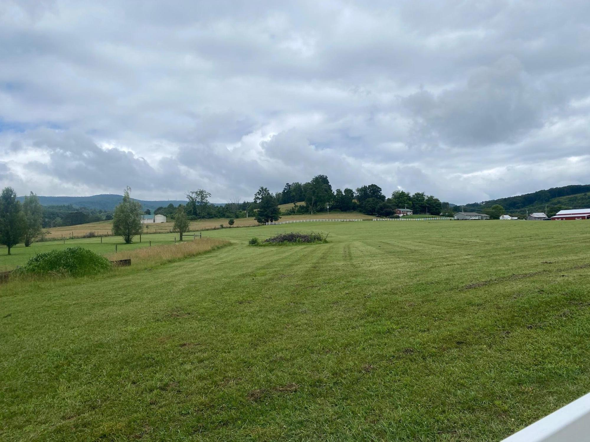 9727 Bent Mountain Road Bent Mountain, VA 24059 - Photo 5 of 6 a view of a golf course with a lake