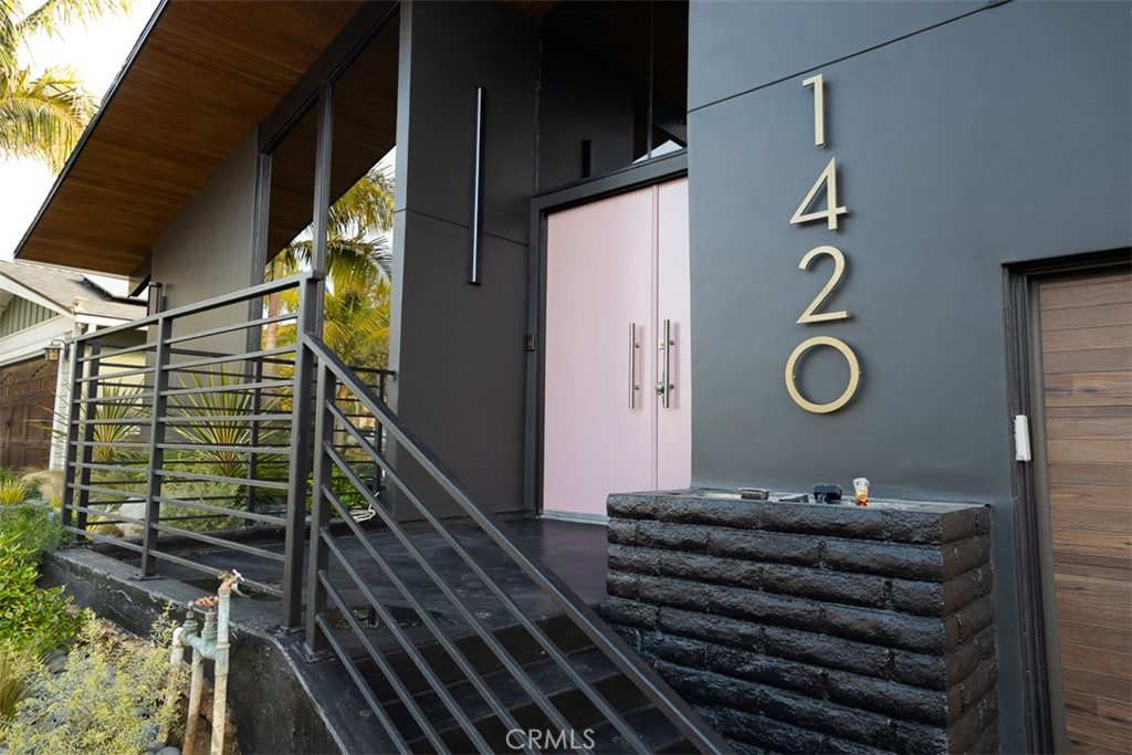 1420 Crestview Avenue Seal Beach, CA 90740 - Photo 2 of 26 a bathroom with a mirror and shower