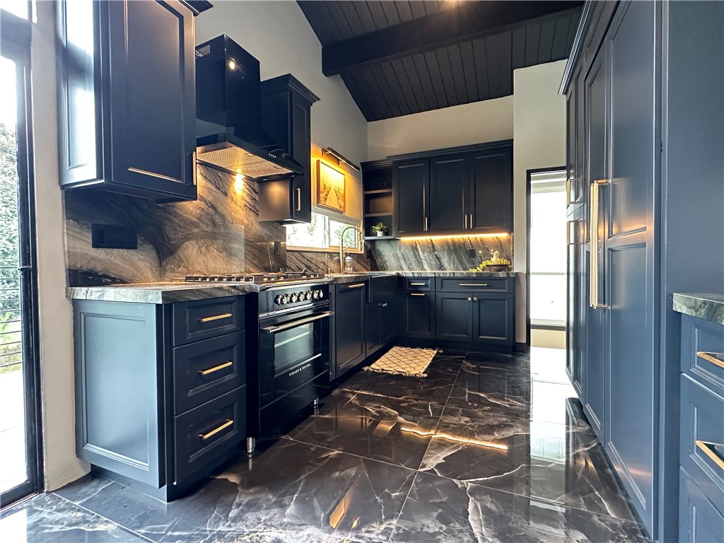 1420 Crestview Avenue Seal Beach, CA 90740 - Photo 3 of 26 a kitchen with granite countertop a stove and a wooden cabinets