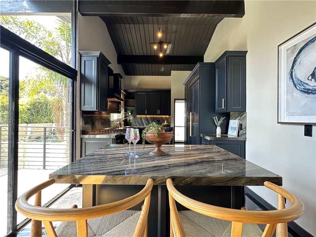 1420 Crestview Avenue Seal Beach, CA 90740 - Photo 6 of 26 a kitchen view with granite countertop a sink a counter top space and stainless steel appliances