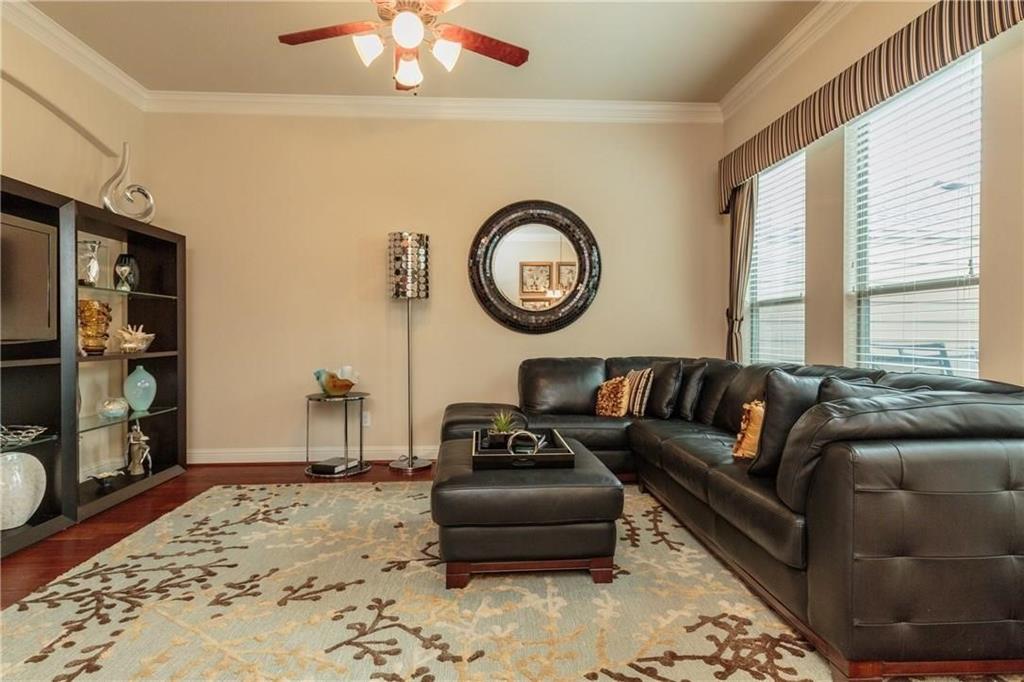 4673 Edith Street Plano, TX 75024 - Photo 23 of 35 a living room with furniture a couch and a window