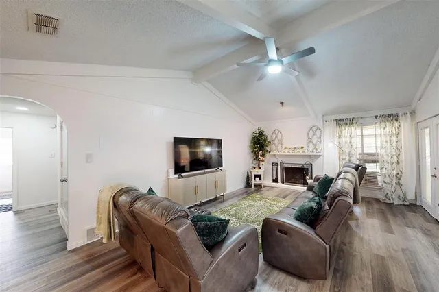 a bathroom with a bathtub and shower