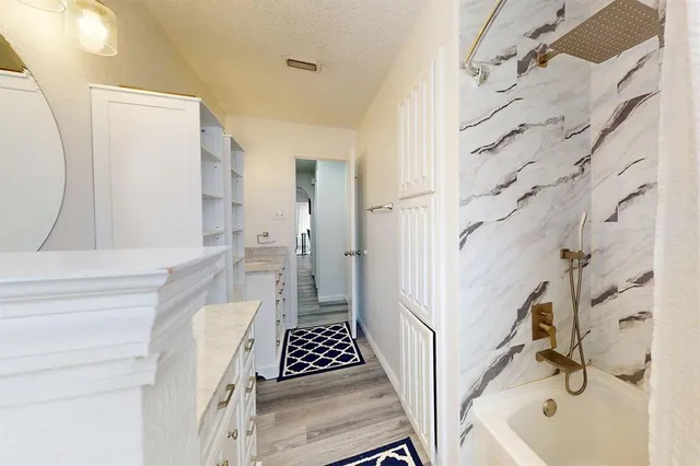 a view of an entryway with a floor to ceiling window