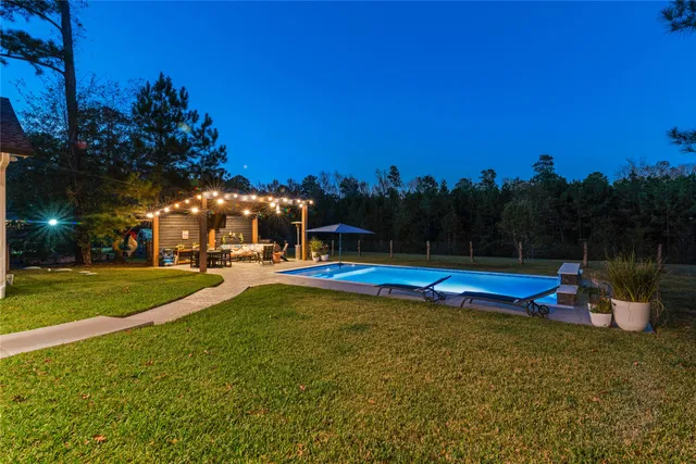 a view of a tiny house with a yard