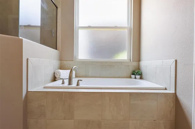 a bathroom with a bathtub