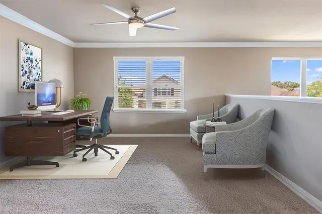 a workspace with furniture and a window