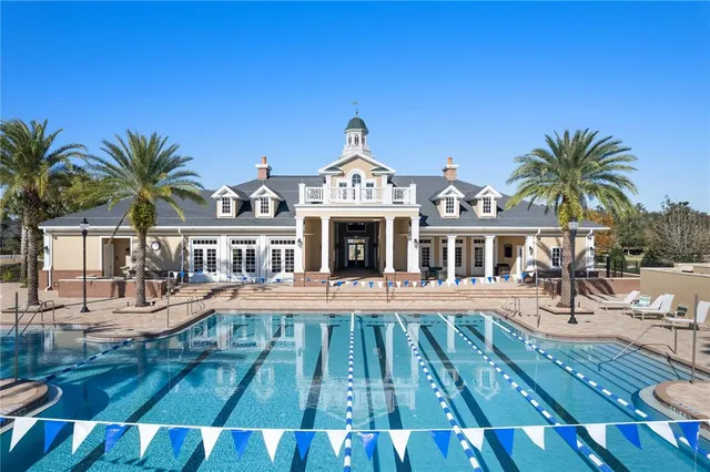 a view of a house with wooden floor and outdoor space
