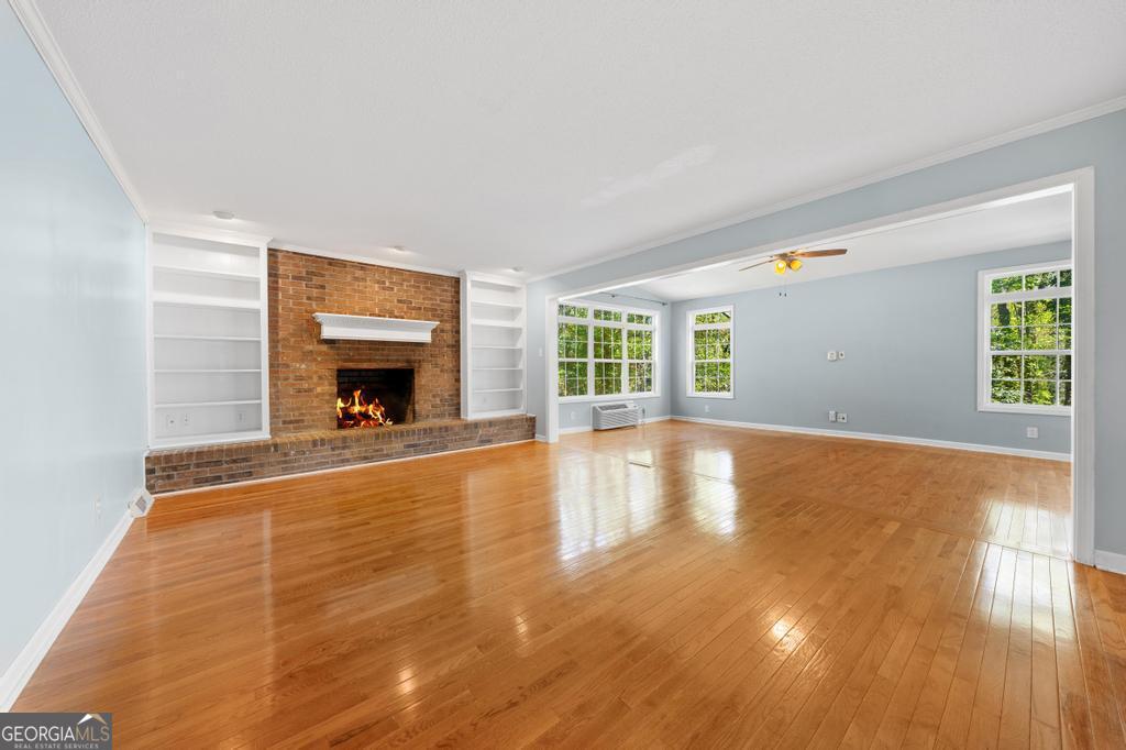 73 Ridgeview Heights Toccoa, GA 30577 - Photo 3 of 41 a view of empty room with wooden floor and fan