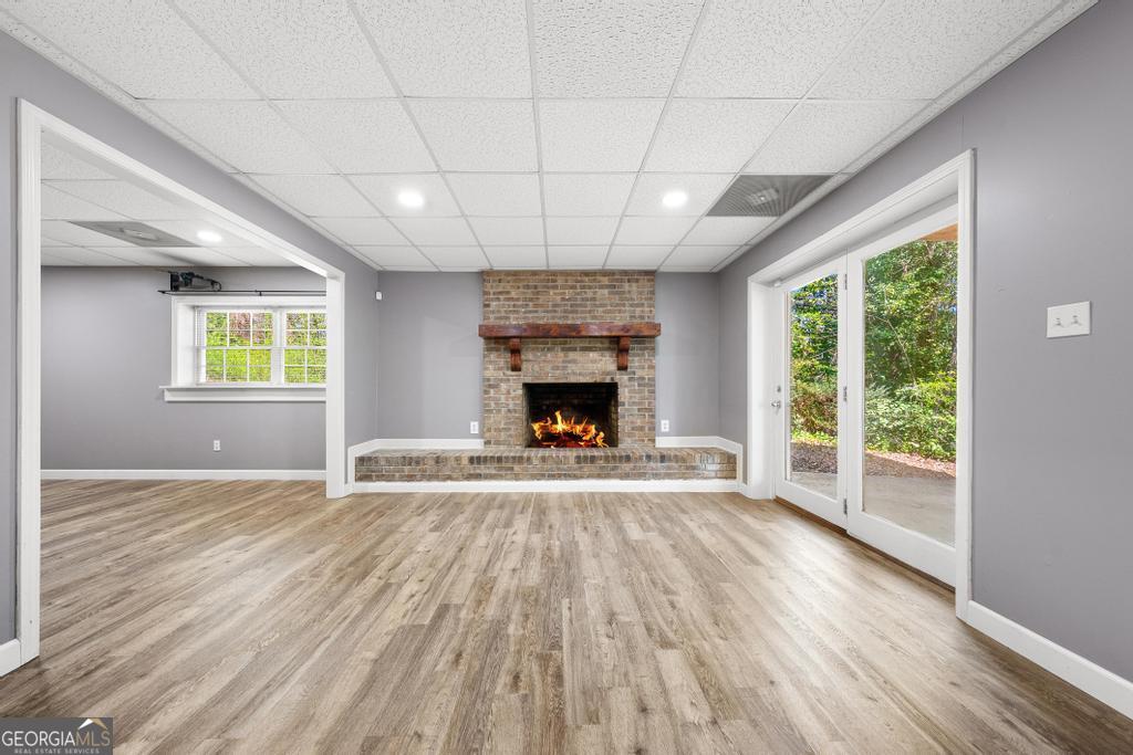 73 Ridgeview Heights Toccoa, GA 30577 - Photo 4 of 41 a view of an empty room with wooden floor and a window