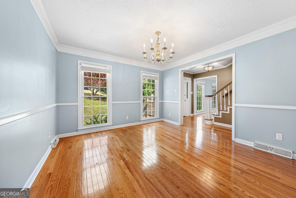 73 Ridgeview Heights Toccoa, GA 30577 - Photo 10 of 41 a view of an empty room with wooden floor and a window