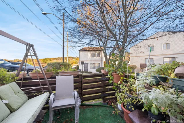 a view of a chairs in the patio