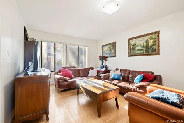 a living room with furniture and a window
