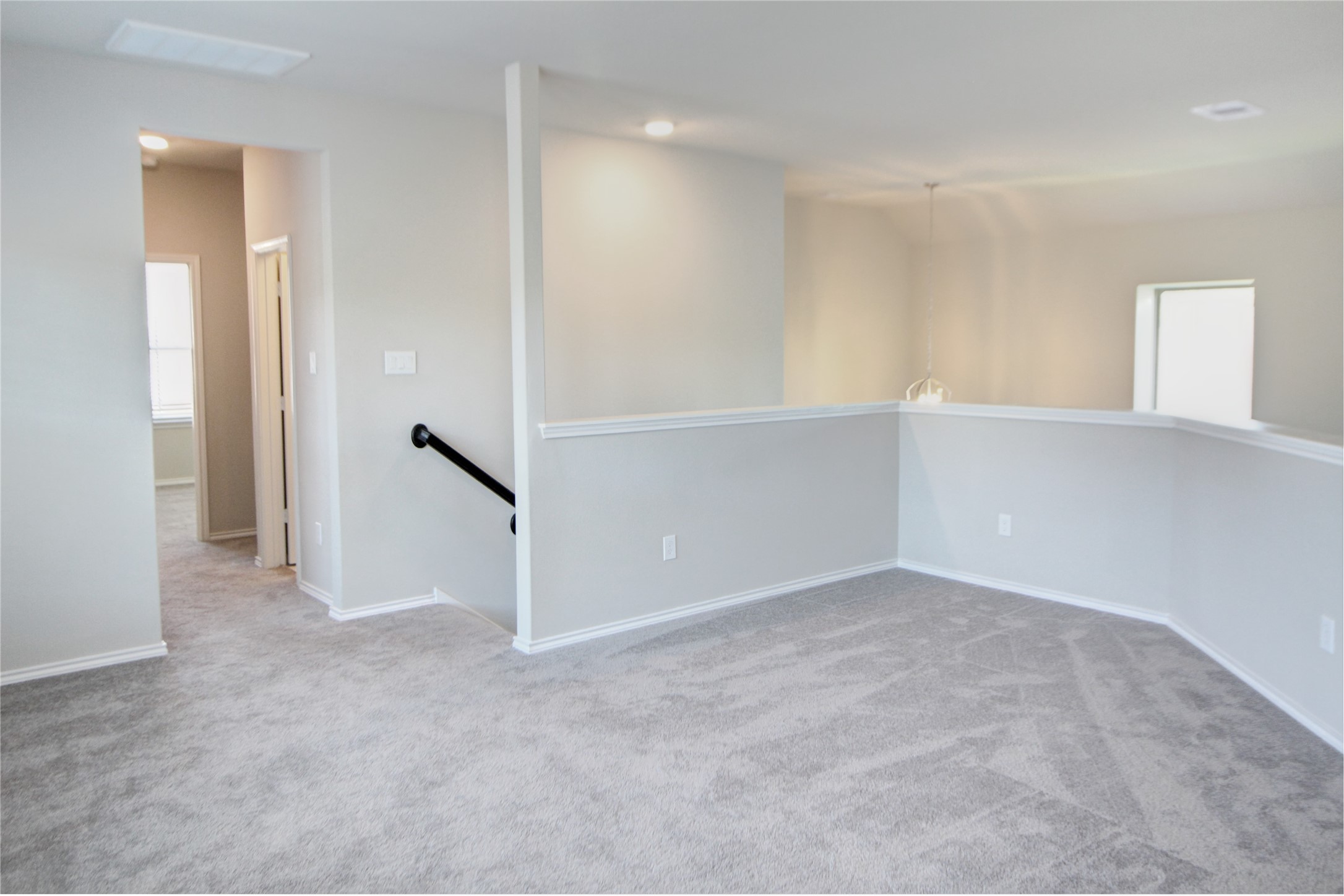 523 Timber Voyage Court Conroe, TX 77304 - Photo 16 of 20 an empty room with windows