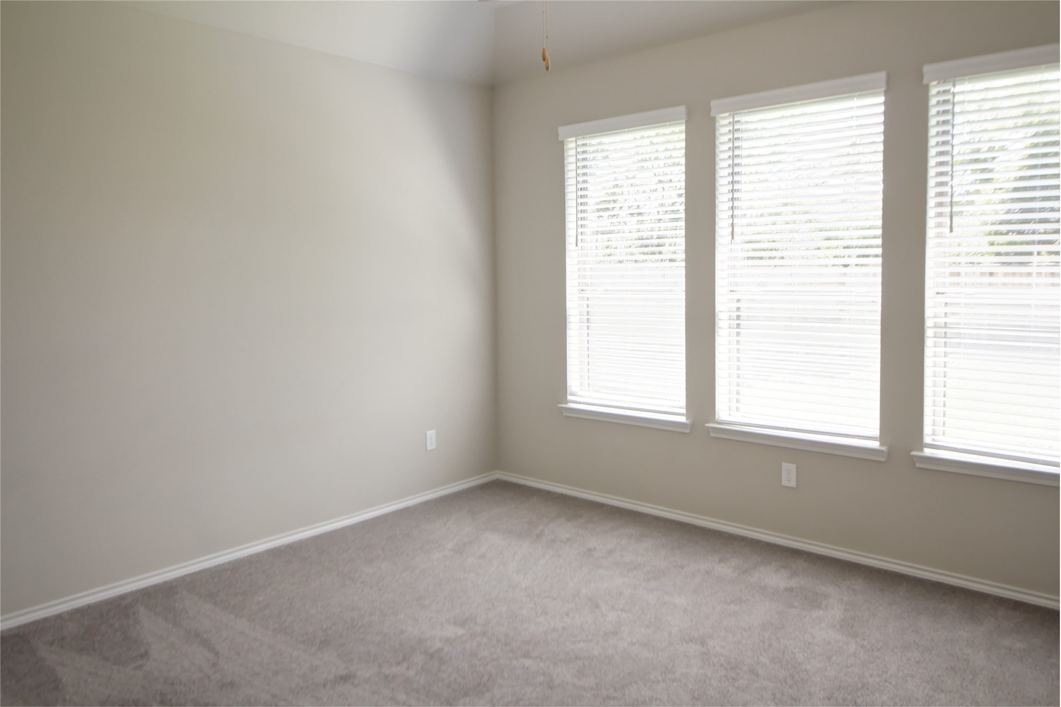 523 Timber Voyage Court Conroe, TX 77304 - Photo 9 of 20 an empty room with a window