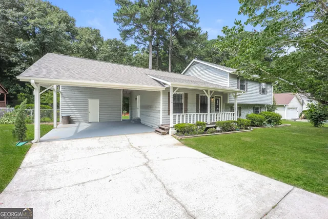 front view of a house with a yard