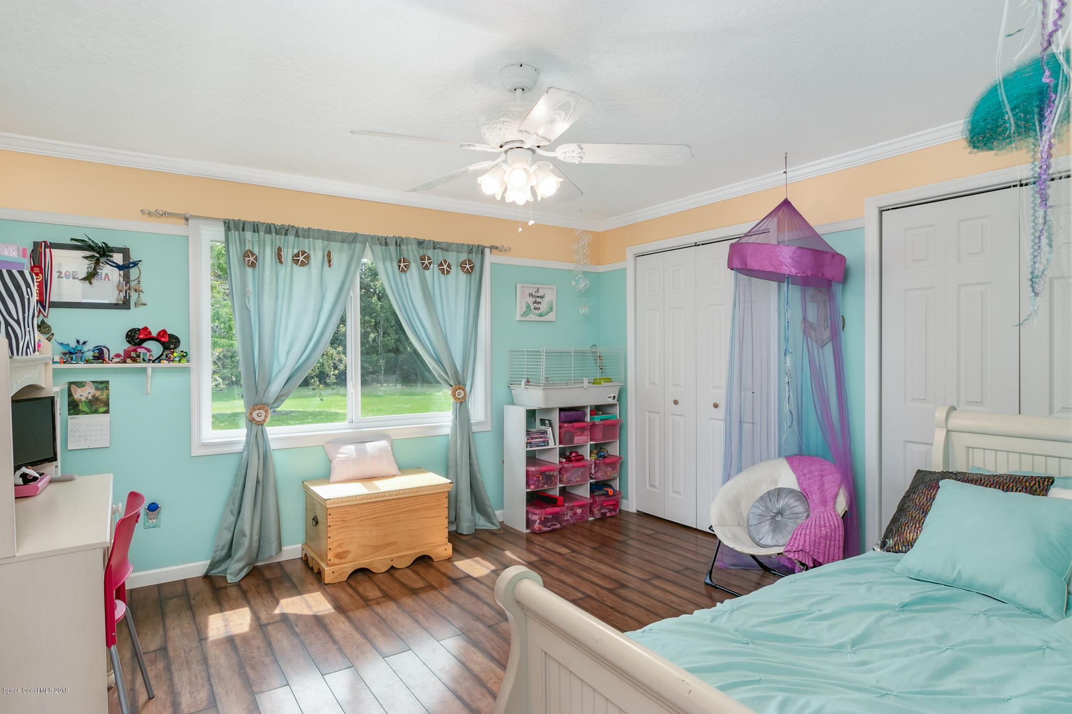 1760 Corey Road Malabar, FL 32950 - Photo 20 of 39 a living room with furniture and a wooden floor