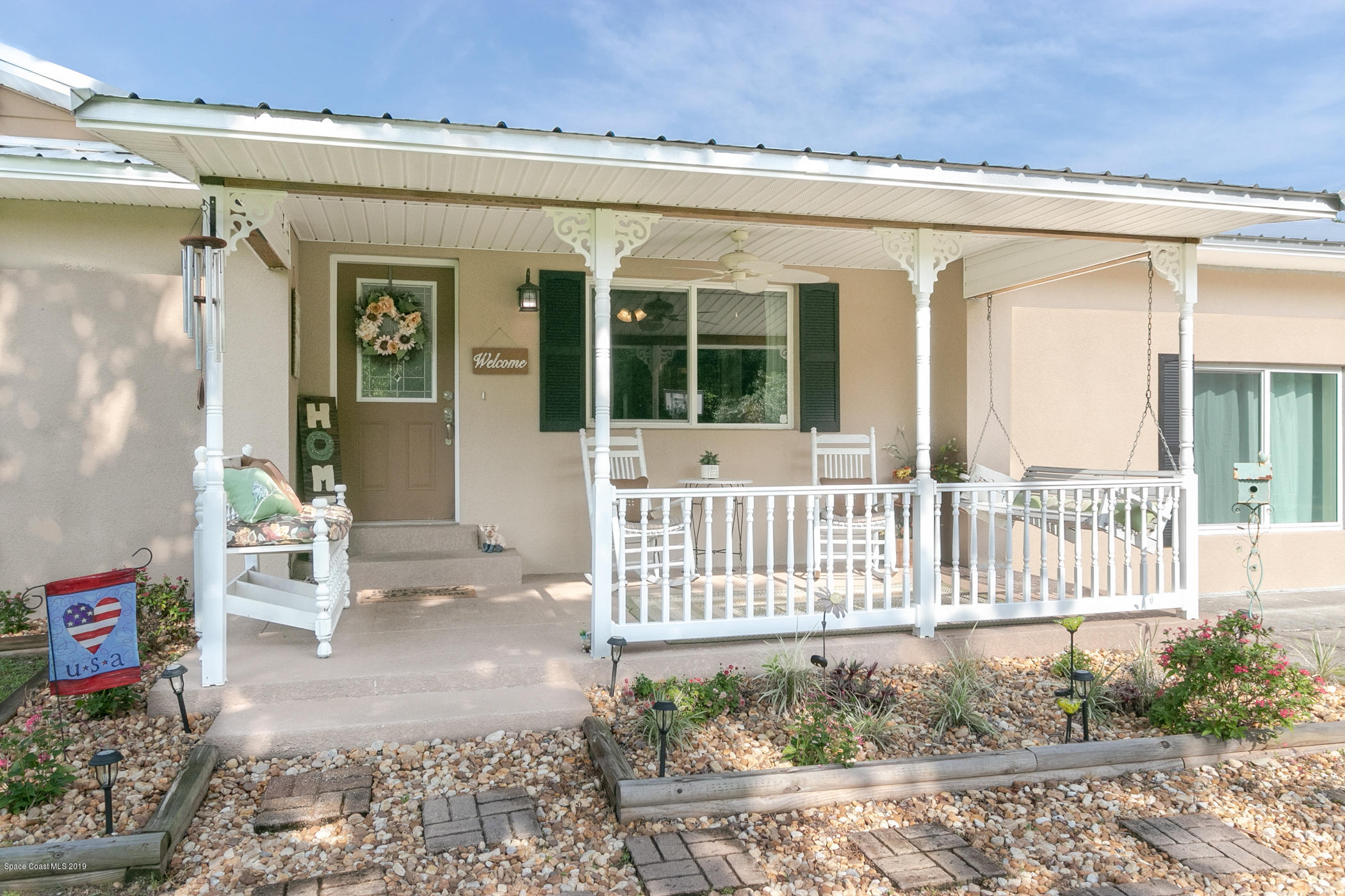 1760 Corey Road Malabar, FL 32950 - Photo 5 of 39 a front view of a house
