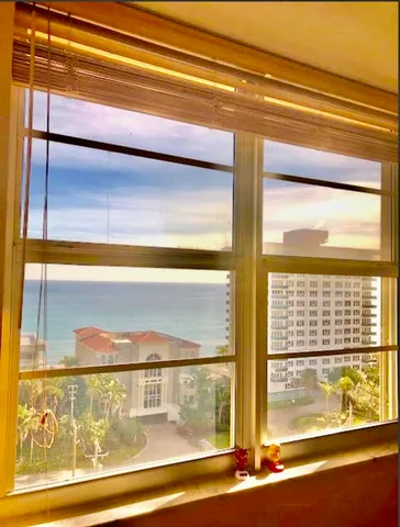 a bathroom with a sink and a window