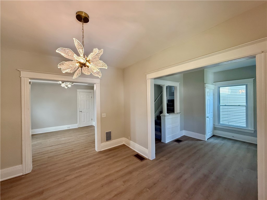 171 Cedarwood Terrace Rochester, NY 14609 - Photo 3 of 29 Generous transitions from room to room give it an open feel.