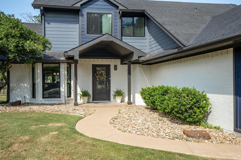 117 Modoc Trail Lake Kiowa, TX 76240 - Photo 4 of 40 Charming walk up with covered porch to welcome your guest.