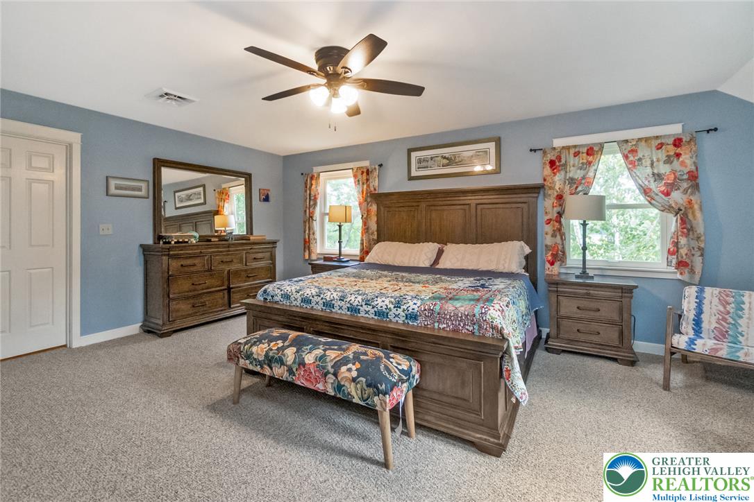1553 Surrey Road Bethlehem, PA 18015 - Photo 32 of 92 Relaxation awaits in this bedroom, offering ample space and a gentle ambiance for tranquil nights.