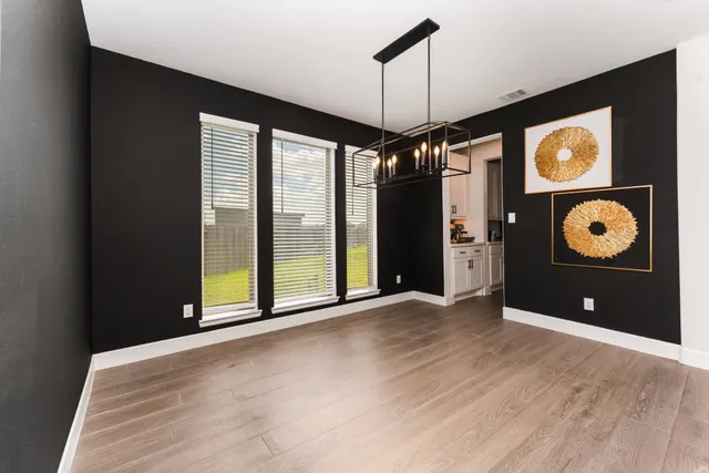 a bathroom with a bathtub and a sink