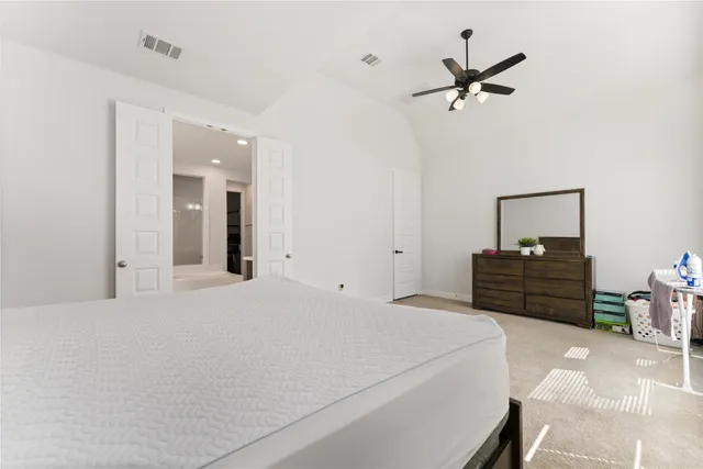 a large bathroom with a bathtub a sink a mirror and a shower