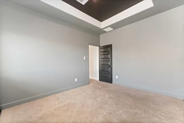 an aerial view of multiple houses with yard