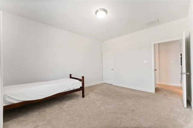 an aerial view of multiple houses with yard