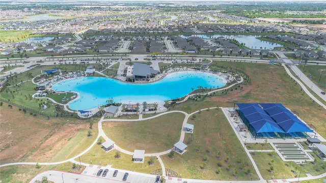 an aerial view of a house with a garden