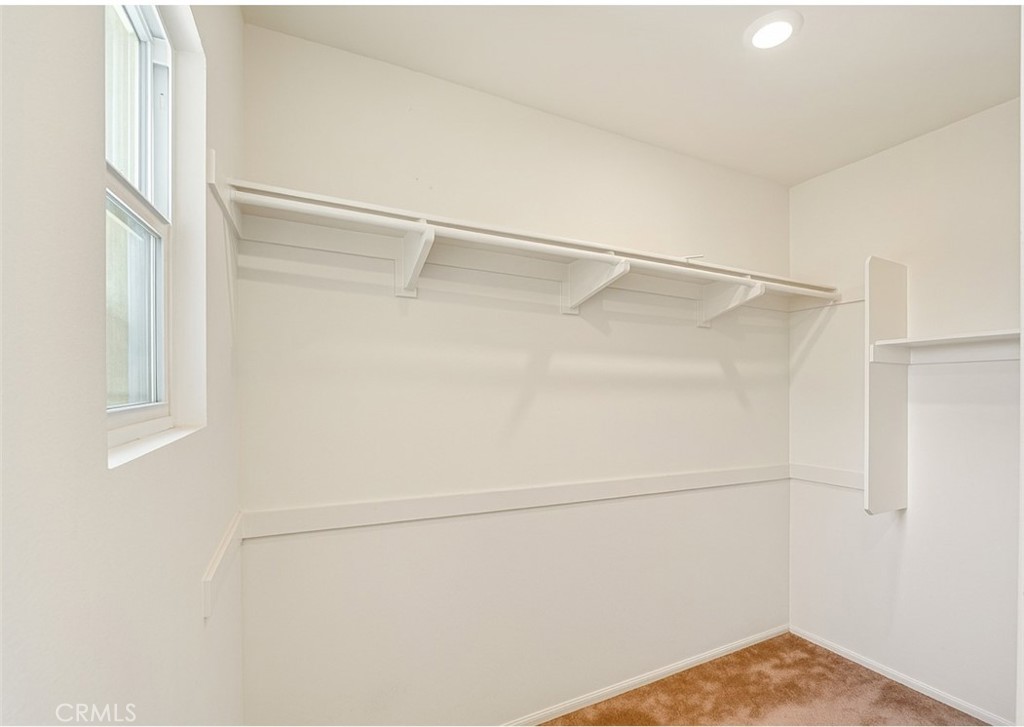 7827 Marbil Lane Riverside, CA 92504 - Photo 18 of 41 Primary Bedroom Walk in Closet