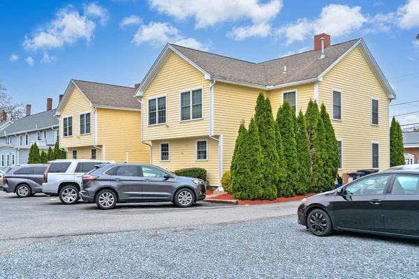 a car parked in front of a house