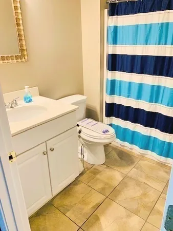 a bathroom with a sink and a toilet