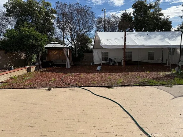a view of a house with a patio