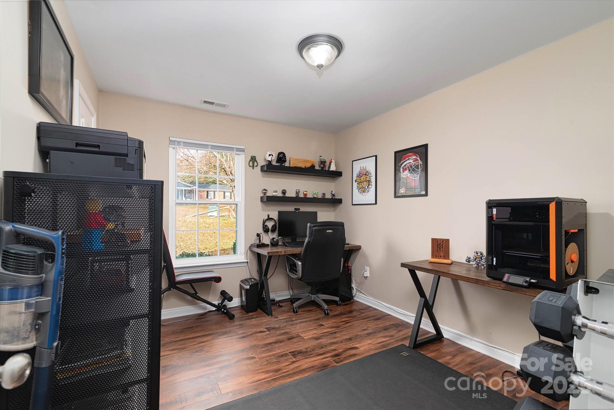 1216 Stevens Road Monroe, NC 28110 - Photo 15 of 40 a view of a workspace with furniture and a window