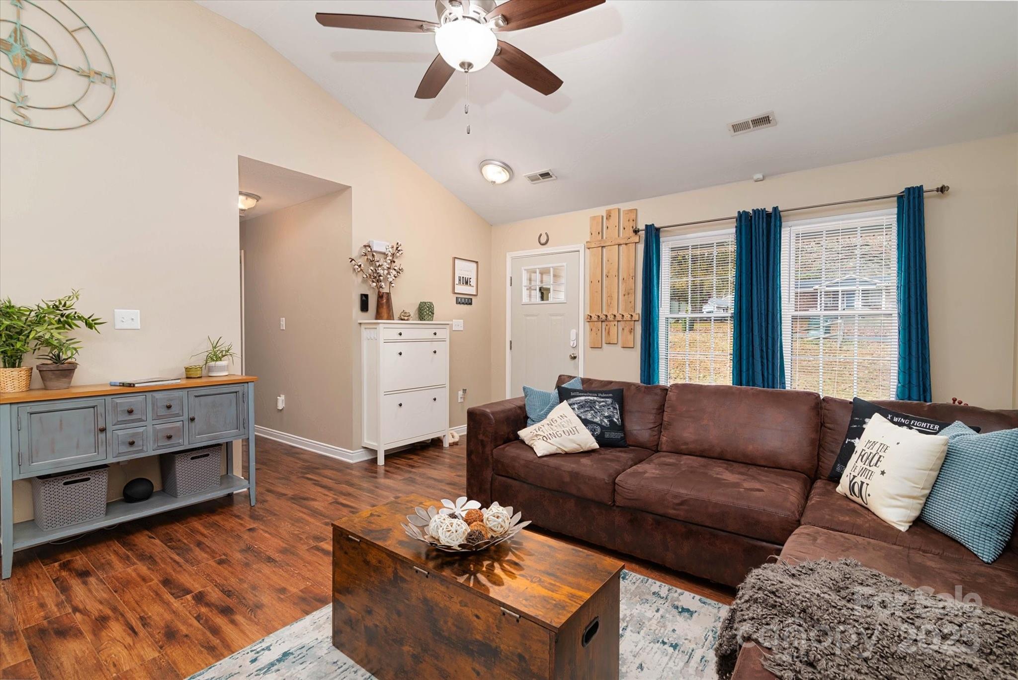 1216 Stevens Road Monroe, NC 28110 - Photo 7 of 40 a living room with furniture fireplace and a window