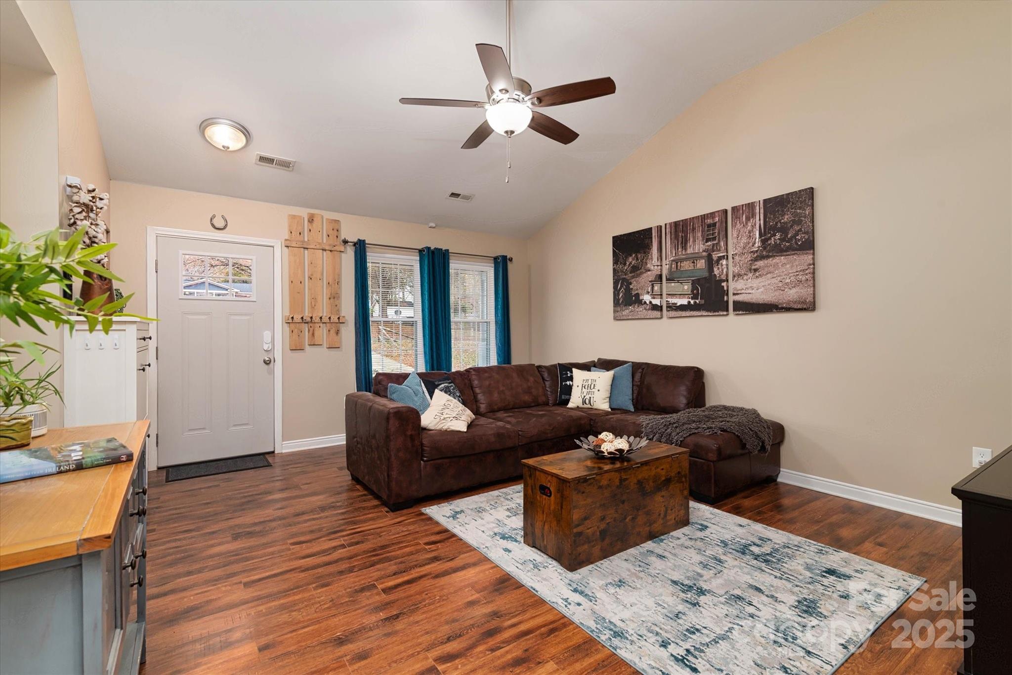 1216 Stevens Road Monroe, NC 28110 - Photo 8 of 40 a living room with furniture and wooden floor