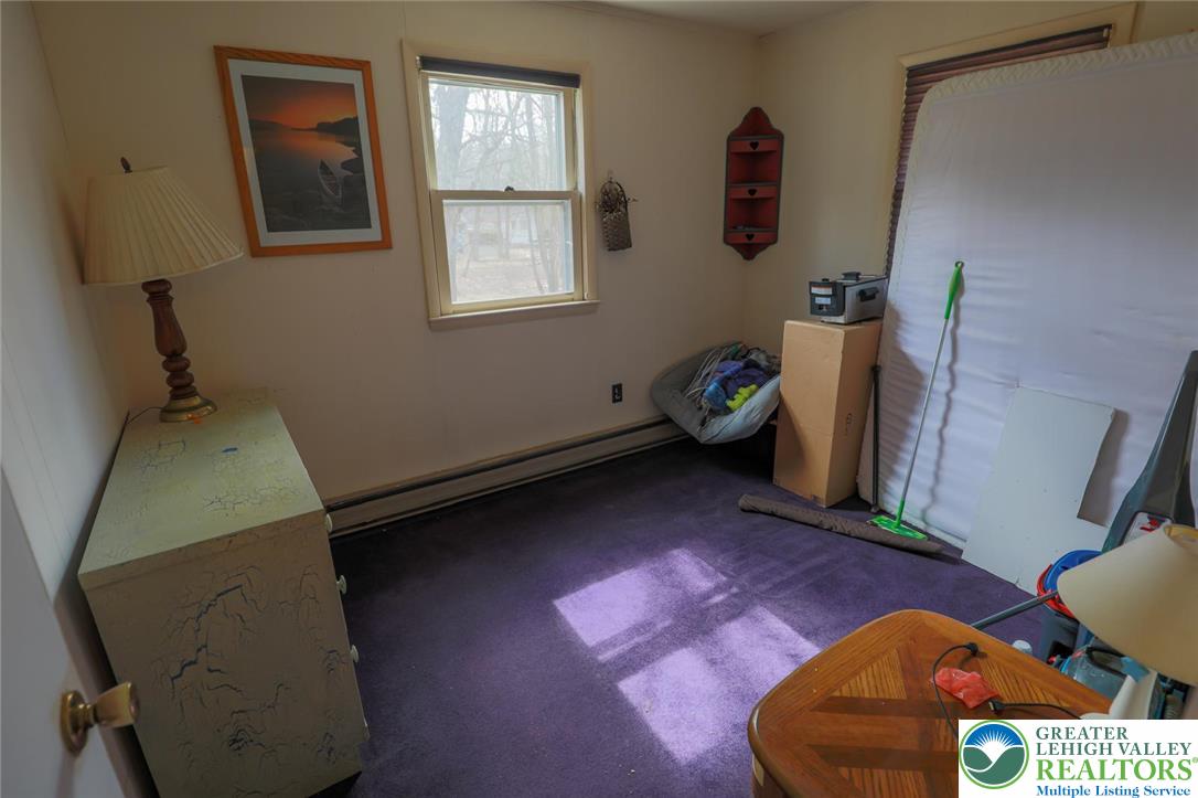 170 Fern Ridge Road Blakeslee, PA 18610 - Photo 9 of 17 a living room with furniture and a window