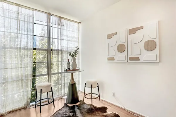 a room with a table and a window