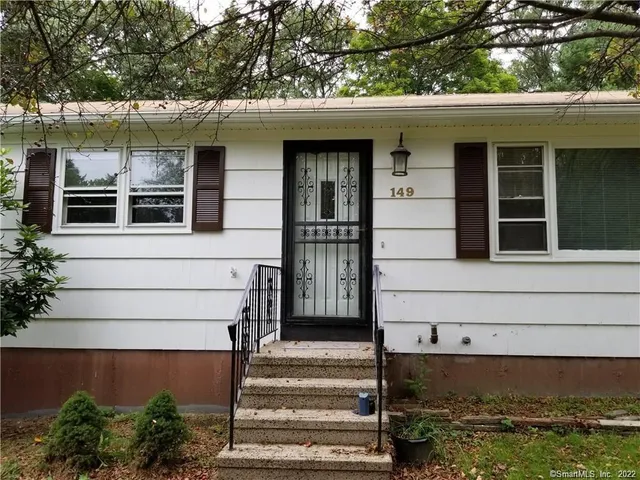 a front view of a house with windows