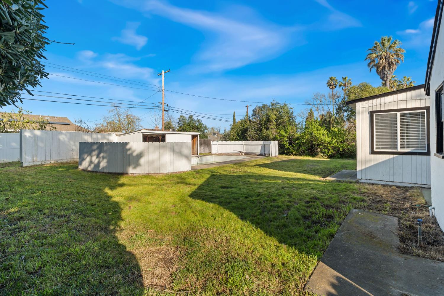 2315 Tyrolean Way Sacramento, CA 95821 - Photo 19 of 27 a view of a house with a yard