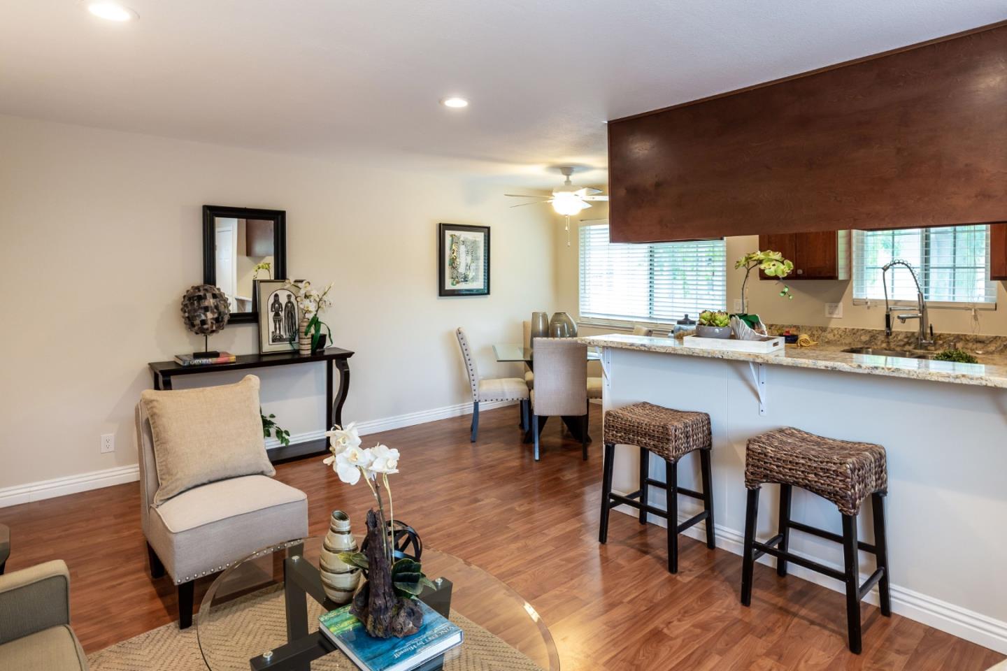 2323 Saidel Drive, Unit 4 San Jose, CA 95124 - Photo 12 of 23 a living room with furniture and wooden floor