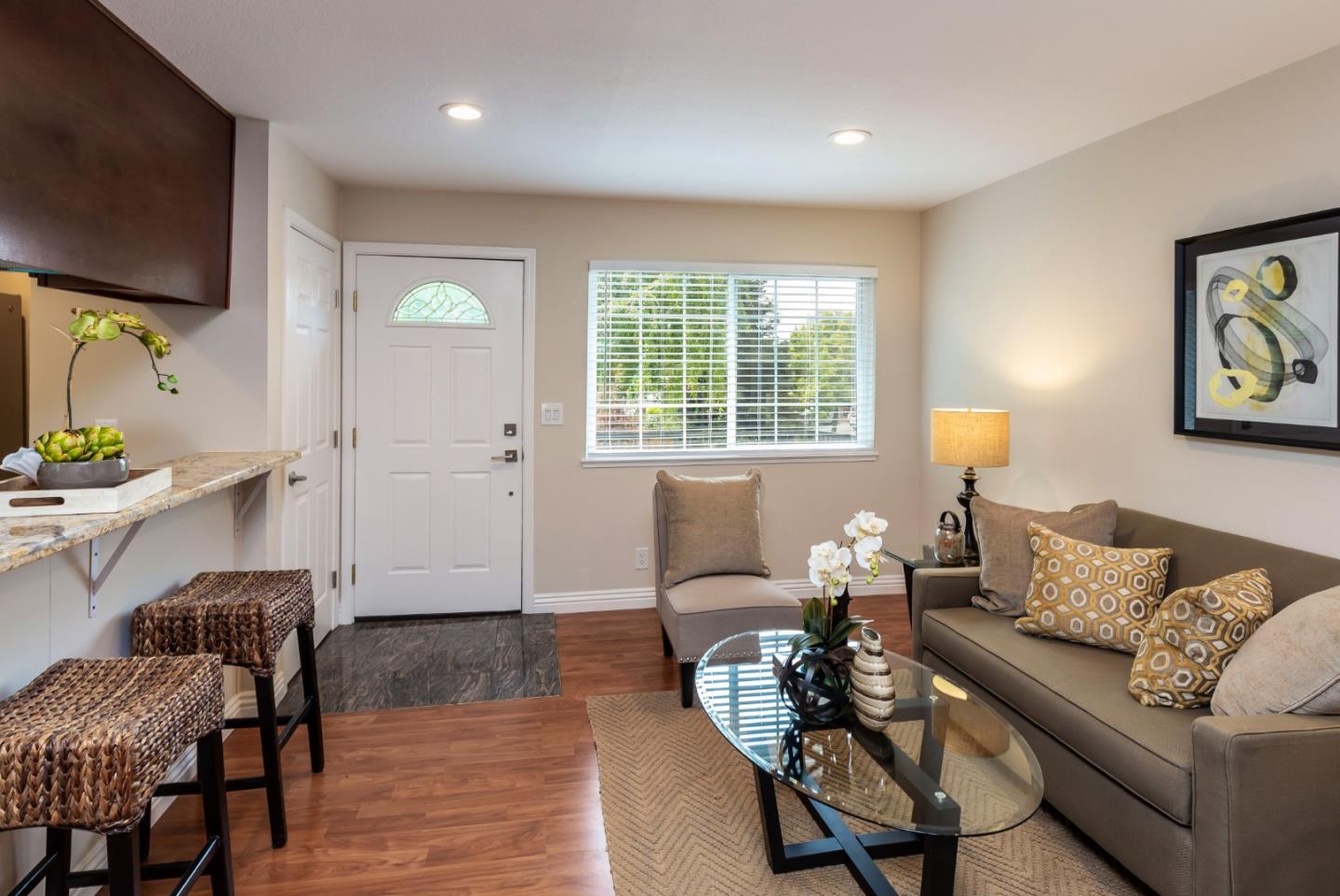 2323 Saidel Drive, Unit 4 San Jose, CA 95124 - Photo 14 of 23 a living room with furniture and a flat screen tv