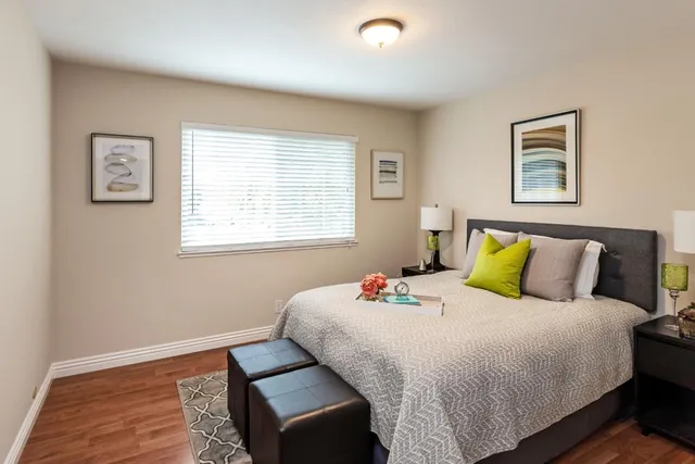 a bedroom with a bed and a walk in closet