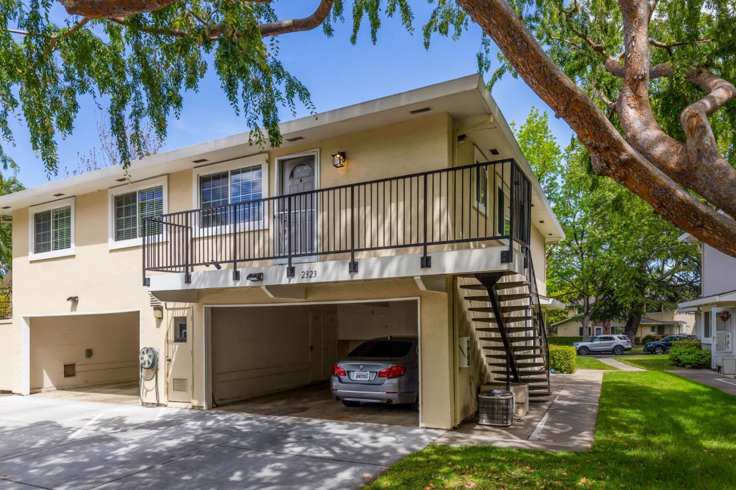 2323 Saidel Drive, Unit 4 San Jose, CA 95124 - Photo 2 of 23 a car parked in front of a house
