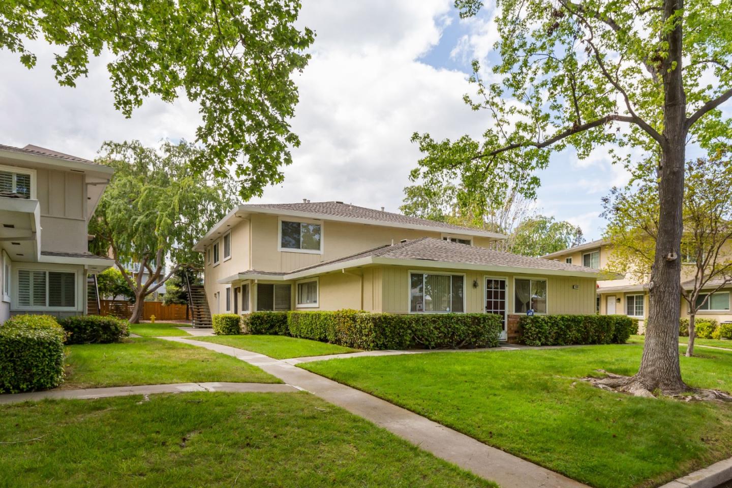 2323 Saidel Drive, Unit 4 San Jose, CA 95124 - Photo 23 of 23 a front view of a house with a yard