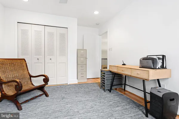 a view of a workspace with furniture