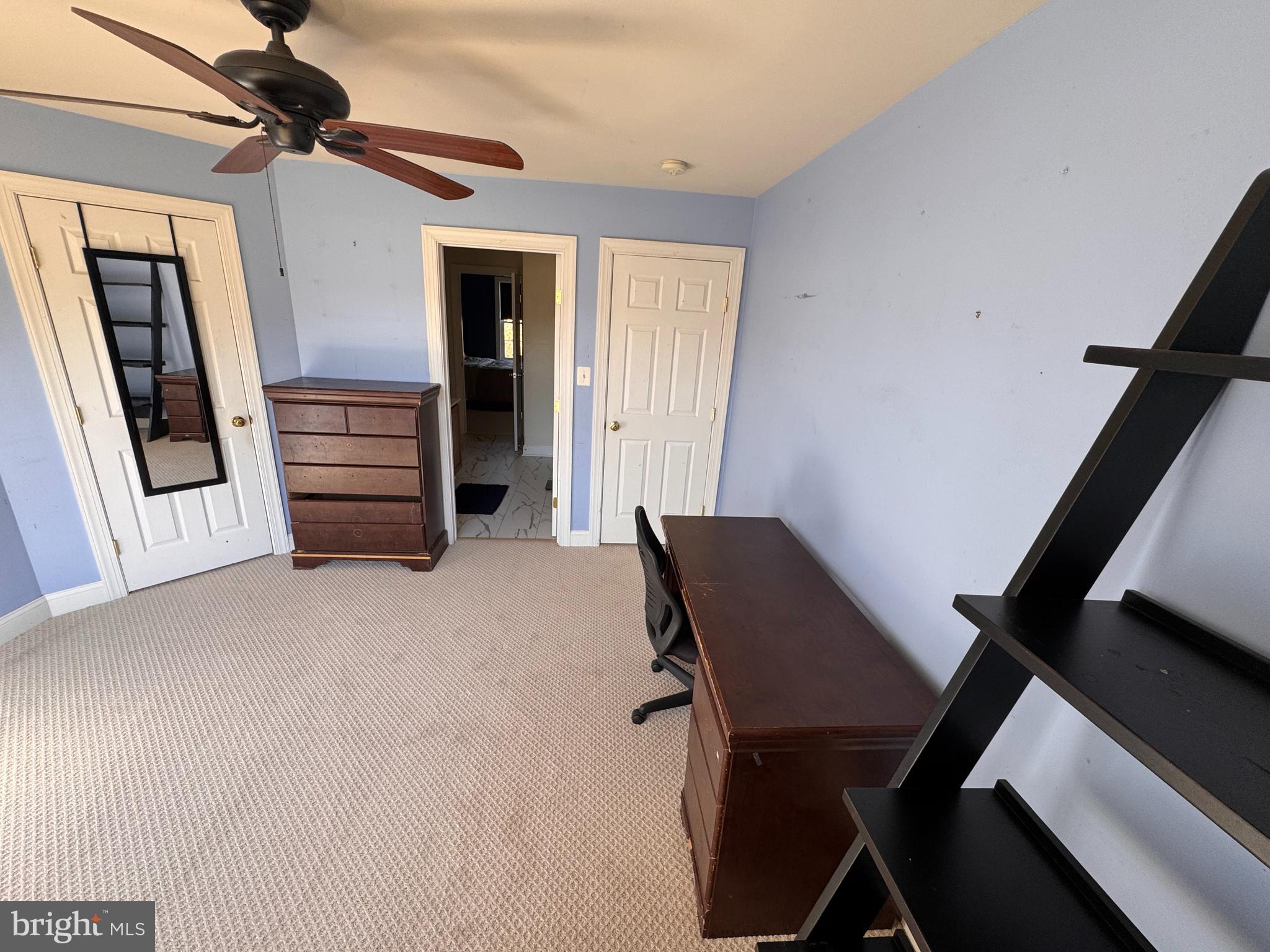 2045 Mount Pleasant Way Prince Frederick, MD 20678 - Photo 23 of 30 a view of a livingroom with furniture and staircase
